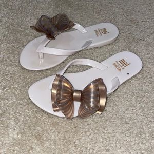 Mel dreamed by Melissa Rubber thong sandals with bow